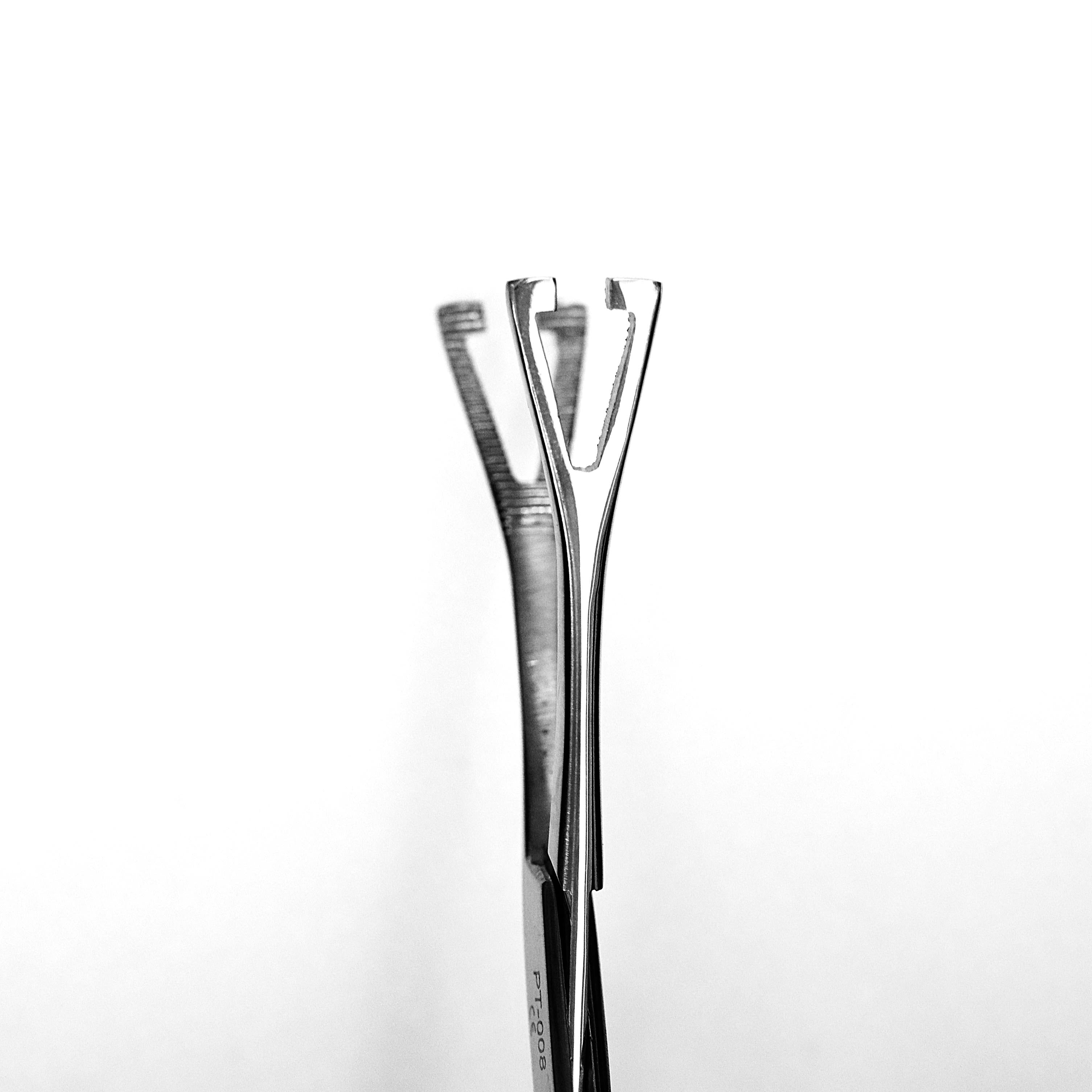 מלקחיים משולש פתוח